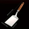 ea9da0ed6eca4f2e68cda854a568c37a_1724495580291 Stainless Steel Spatula with Wood Handle